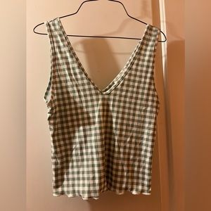 Light-green checkered tank.